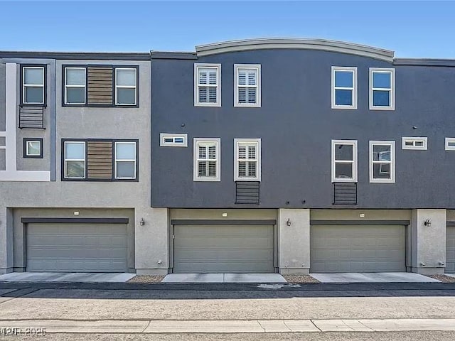 9050 W Tropicana Ave Unit 1015, Las Vegas, NV 89147 - view of front facade featuring stucco siding