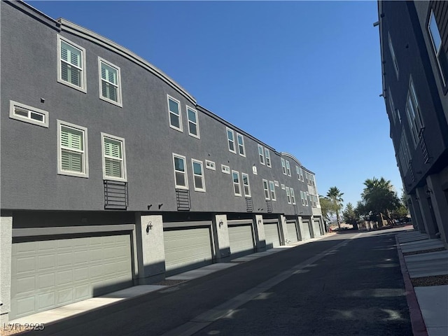 9050 W Tropicana Ave Unit 1015, Las Vegas, NV 89147 - view of road featuring a residential view