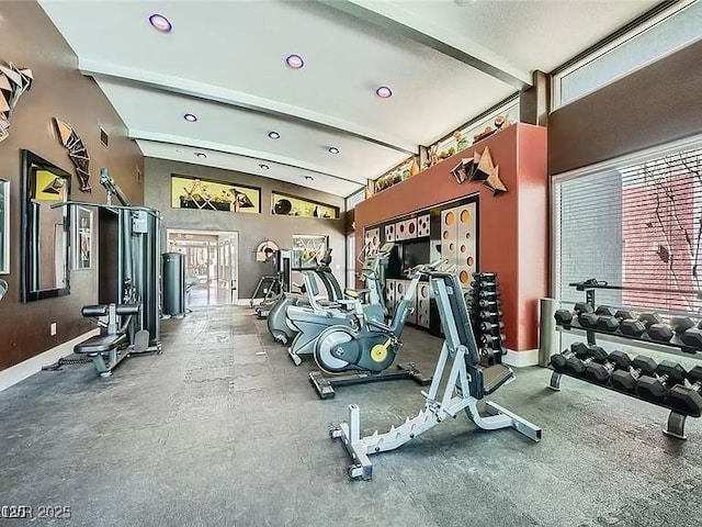 9050 W Tropicana Ave Unit 1015, Las Vegas, NV 89147 - exercise room with beam ceiling, high vaulted ceiling, plenty of natural light, and recessed lighting