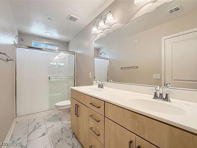 9050 W Tropicana Ave Unit 1015, Las Vegas, NV 89147 - full bath featuring marble look tile flooring, double vanity, and a stall shower