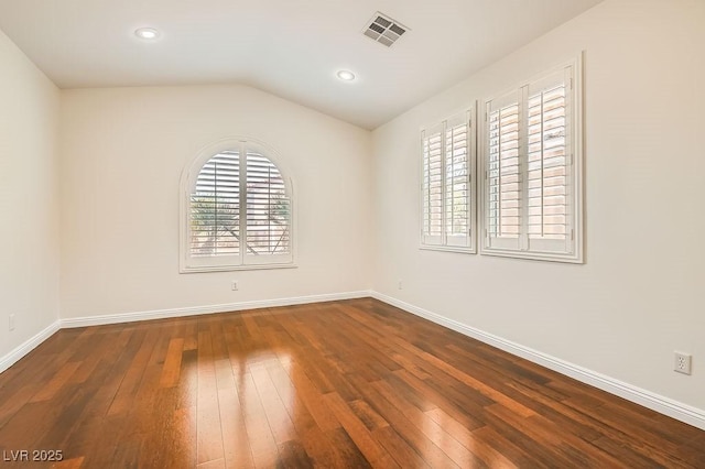 193 Lynbrook St, Henderson, NV 89012 - spare room featuring dark wood-style floors, vaulted ceiling, and recessed lighting