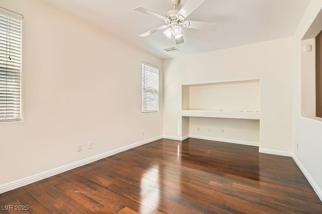 193 Lynbrook St, Henderson, NV 89012 - unfurnished living room featuring wood-type flooring and a ceiling fan