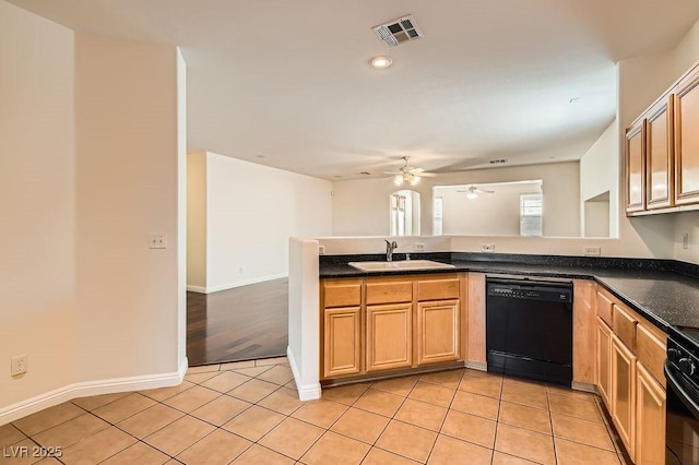 193 Lynbrook St, Henderson, NV 89012 - kitchen with dishwasher, a ceiling fan, a peninsula, dark countertops, and light tile patterned floors