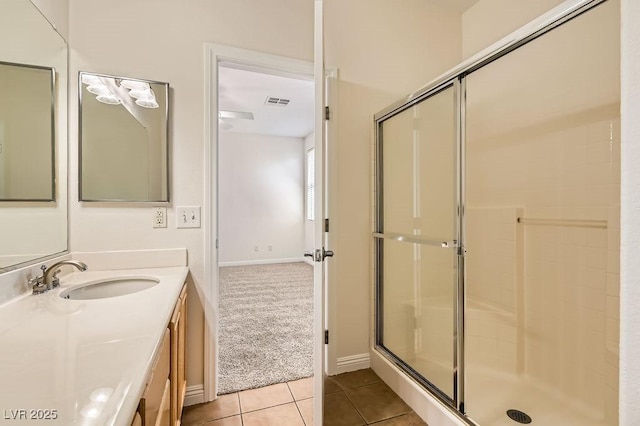 193 Lynbrook St, Henderson, NV 89012 - bathroom with a stall shower, vanity, and tile patterned floors