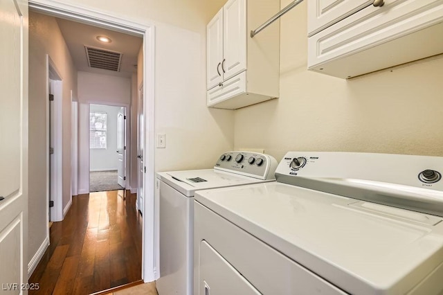 193 Lynbrook St, Henderson, NV 89012 - laundry room with washer and dryer, cabinet space, wood-type flooring, and recessed lighting
