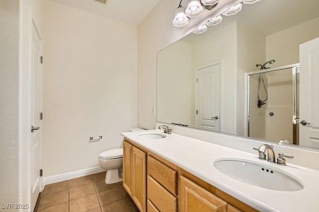 193 Lynbrook St, Henderson, NV 89012 - bathroom with a shower stall, double vanity, and tile patterned flooring