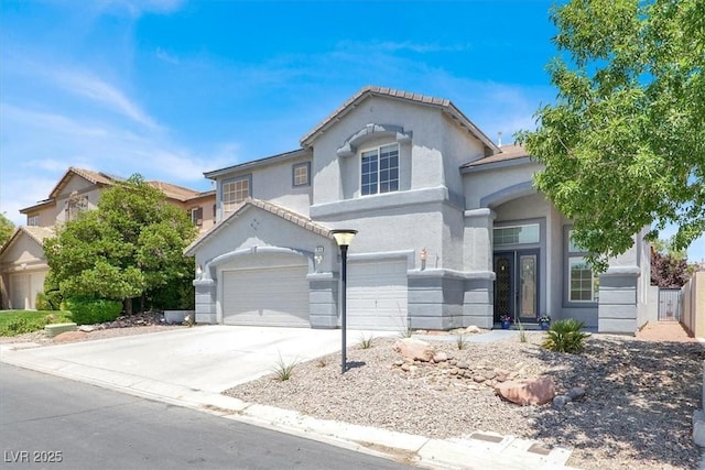 7816 Red Leaf Dr, Las Vegas, NV 89131 - mediterranean / spanish home with driveway, stucco siding, and an attached garage