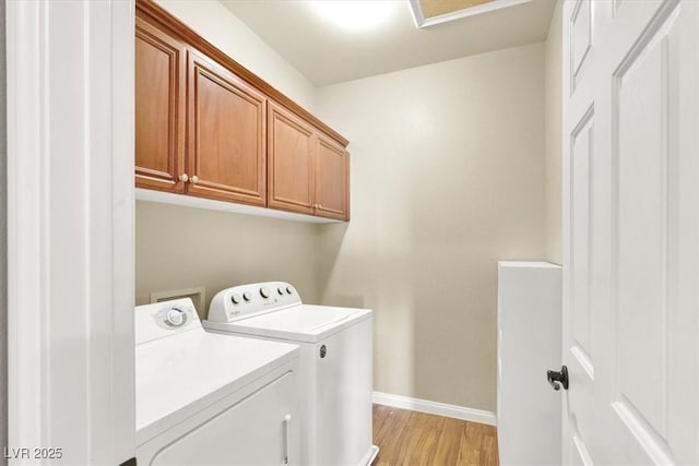 7816 Red Leaf Dr, Las Vegas, NV 89131 - laundry room featuring washer and dryer, cabinet space, and light wood-style floors