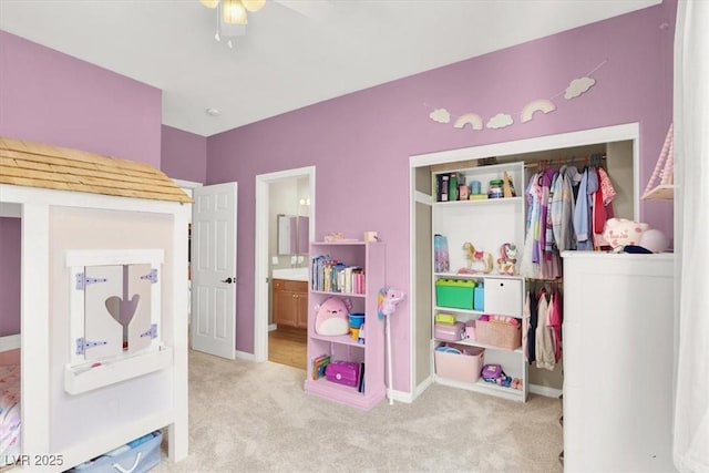 7816 Red Leaf Dr, Las Vegas, NV 89131 - carpeted bedroom with ensuite bathroom and baseboards