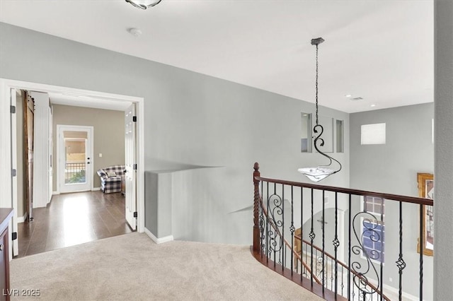7816 Red Leaf Dr, Las Vegas, NV 89131 - corridor with an upstairs landing and carpet