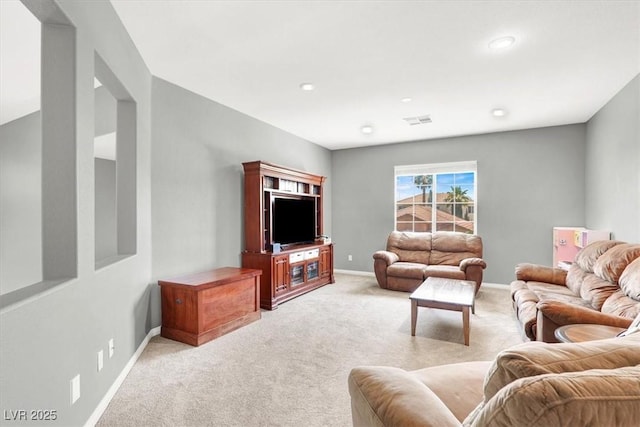 7816 Red Leaf Dr, Las Vegas, NV 89131 - living room with light carpet and recessed lighting
