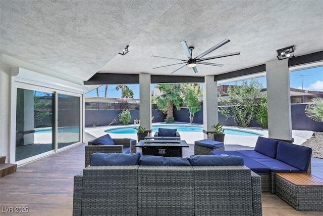 1900 S 15th St, Las Vegas, NV 89104 - fenced backyard featuring outdoor lounge area and a ceiling fan