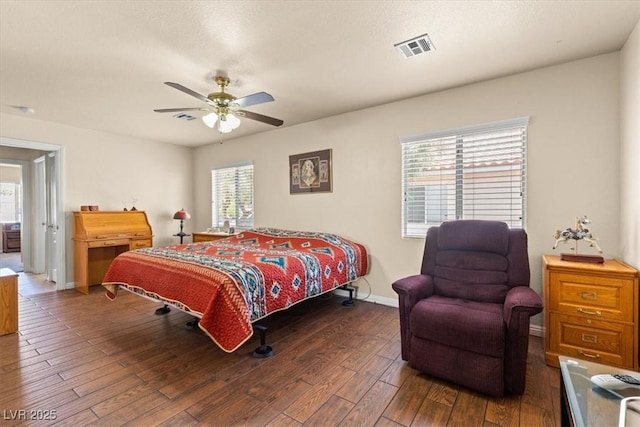 5208 Regena Rose St, North Las Vegas, NV 89081 - bedroom with multiple windows, wood finished floors, and a ceiling fan