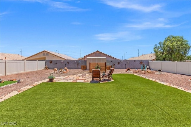 5208 Regena Rose St, North Las Vegas, NV 89081 - fenced backyard featuring a patio