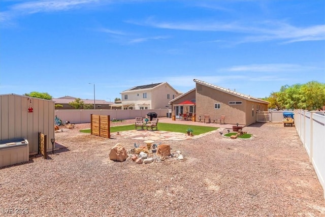 5208 Regena Rose St, North Las Vegas, NV 89081 - fenced backyard with a patio area