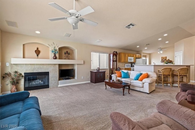 5208 Regena Rose St, North Las Vegas, NV 89081 - living area with ceiling fan, light carpet, a fireplace, and recessed lighting