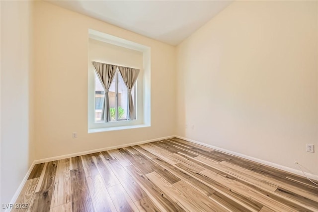 8805 Jeffreys St Unit 1089, Las Vegas, NV 89123 - unfurnished room with wood finished floors and baseboards
