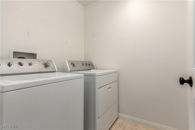 520 Ivy Spring St, Las Vegas, NV 89138 - washroom with washing machine and dryer and light tile patterned floors