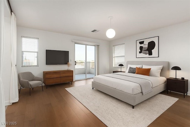 520 Ivy Spring St, Las Vegas, NV 89138 - bedroom with access to exterior and wood finished floors
