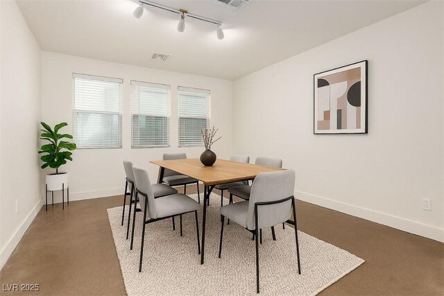 520 Ivy Spring St, Las Vegas, NV 89138 - dining area with track lighting and finished concrete floors
