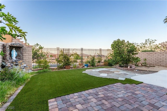 520 Ivy Spring St, Las Vegas, NV 89138 - view of yard with a patio