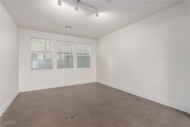 520 Ivy Spring St, Las Vegas, NV 89138 - spare room featuring track lighting and concrete flooring