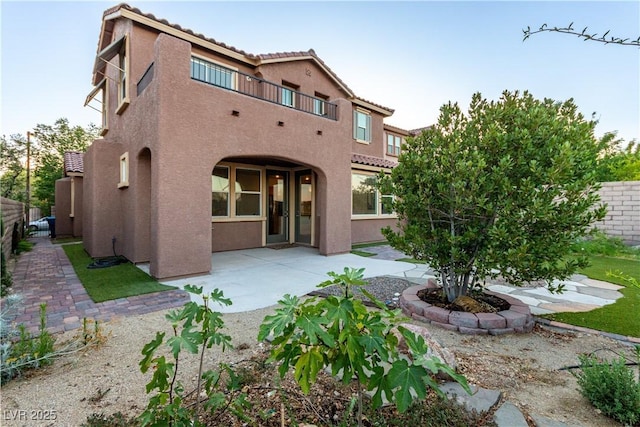 520 Ivy Spring St, Las Vegas, NV 89138 - back of house featuring stucco siding, a patio, and a tile roof