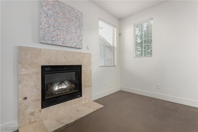 520 Ivy Spring St, Las Vegas, NV 89138 - detailed view of baseboards and a tiled fireplace