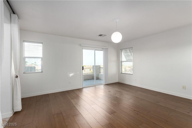 520 Ivy Spring St, Las Vegas, NV 89138 - unfurnished room featuring baseboards and hardwood / wood-style floors