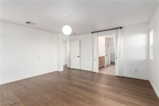 520 Ivy Spring St, Las Vegas, NV 89138 - unfurnished bedroom featuring light wood finished floors and ensuite bathroom