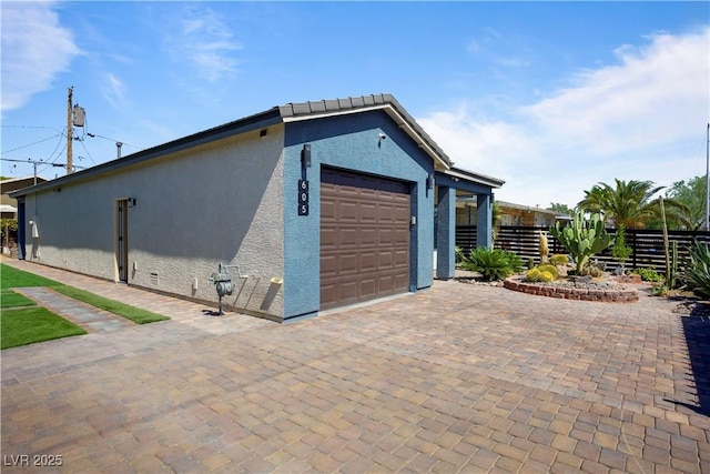 605 N Yale St, Las Vegas, NV 89107 - garage featuring decorative driveway