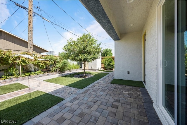 605 N Yale St, Las Vegas, NV 89107 - fenced backyard with a patio and an outdoor structure