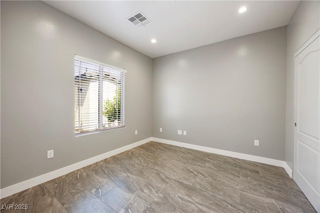 605 N Yale St, Las Vegas, NV 89107 - spare room featuring marble finish flooring and recessed lighting