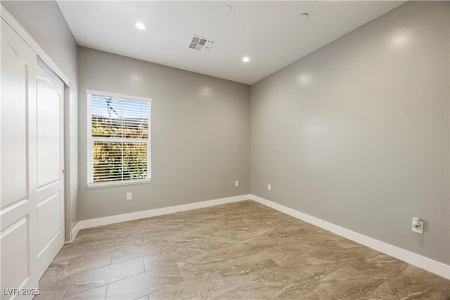 605 N Yale St, Las Vegas, NV 89107 - unfurnished room with light marble finish floors and recessed lighting