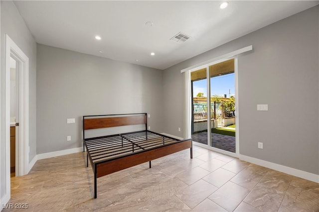 605 N Yale St, Las Vegas, NV 89107 - unfurnished bedroom with access to outside, marble look tile flooring, and recessed lighting