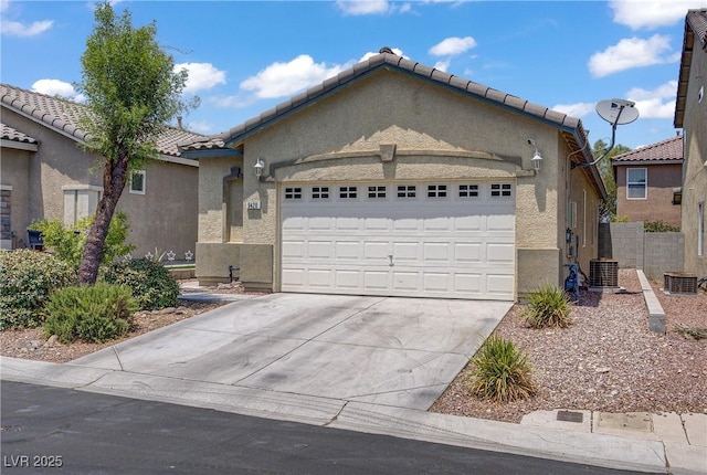 9420 Plover Falls Ave, Las Vegas, NV 89149 - ranch-style home featuring stucco siding, driveway, a garage, and a tiled roof