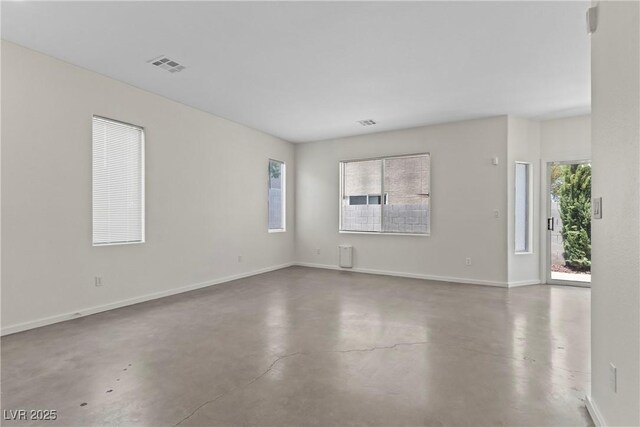 9420 Plover Falls Ave, Las Vegas, NV 89149 - unfurnished room featuring concrete flooring and baseboards