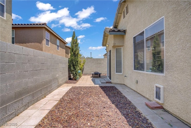 9420 Plover Falls Ave, Las Vegas, NV 89149 - fenced backyard featuring a patio area