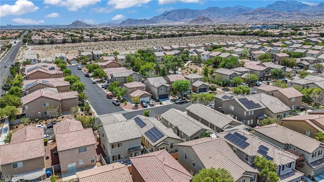 9420 Plover Falls Ave, Las Vegas, NV 89149 - aerial perspective of suburban area with a mountain backdrop