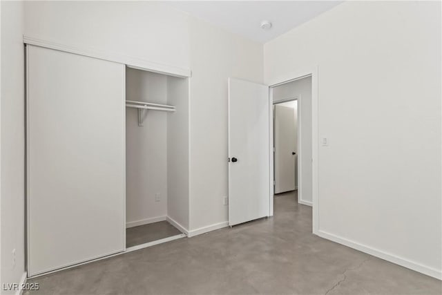 9420 Plover Falls Ave, Las Vegas, NV 89149 - unfurnished bedroom with concrete floors and a closet