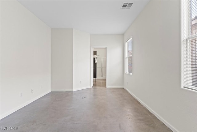 9420 Plover Falls Ave, Las Vegas, NV 89149 - empty room with finished concrete floors and plenty of natural light
