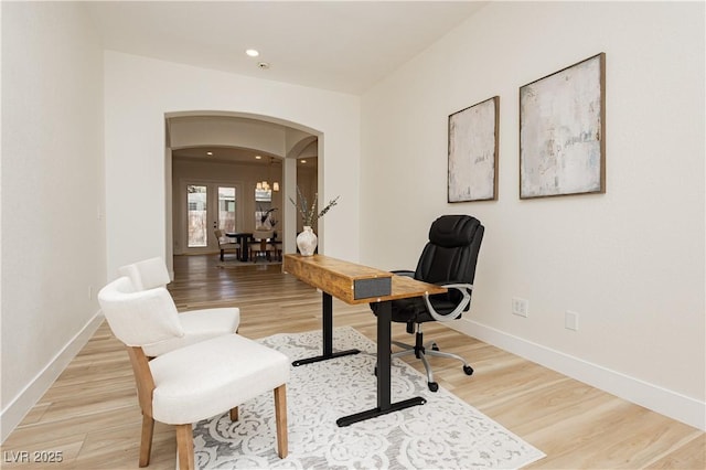 4493 Rometta Ave, Las Vegas, NV 89141 - office space featuring arched walkways, light wood-style floors, and recessed lighting