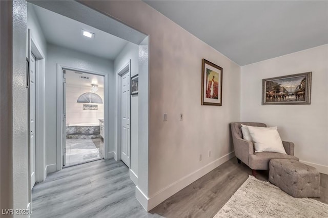 895 Beartooth Falls Ct, Henderson, NV 89052 - living area featuring light wood-type flooring and baseboards