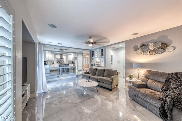 895 Beartooth Falls Ct, Henderson, NV 89052 - living area featuring ceiling fan, light marble finish flooring, and recessed lighting