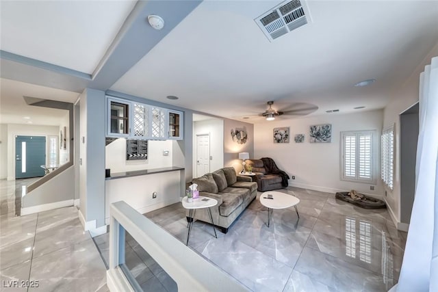 895 Beartooth Falls Ct, Henderson, NV 89052 - living room with light marble finish flooring and ceiling fan