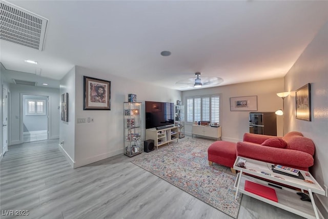 895 Beartooth Falls Ct, Henderson, NV 89052 - living area featuring wood finished floors and a ceiling fan