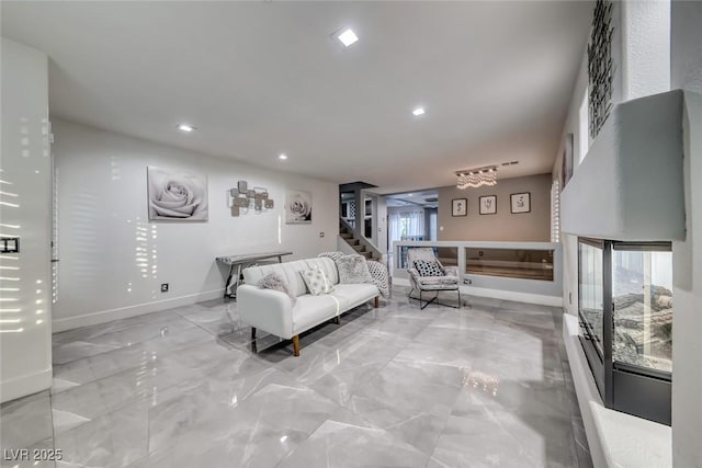 895 Beartooth Falls Ct, Henderson, NV 89052 - living room with stairs, recessed lighting, and marble finish floors