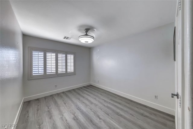 895 Beartooth Falls Ct, Henderson, NV 89052 - empty room with wood finished floors and baseboards