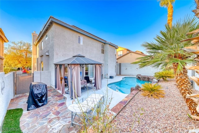 895 Beartooth Falls Ct, Henderson, NV 89052 - view of pool featuring a gazebo, a gate, a fenced backyard, and a patio