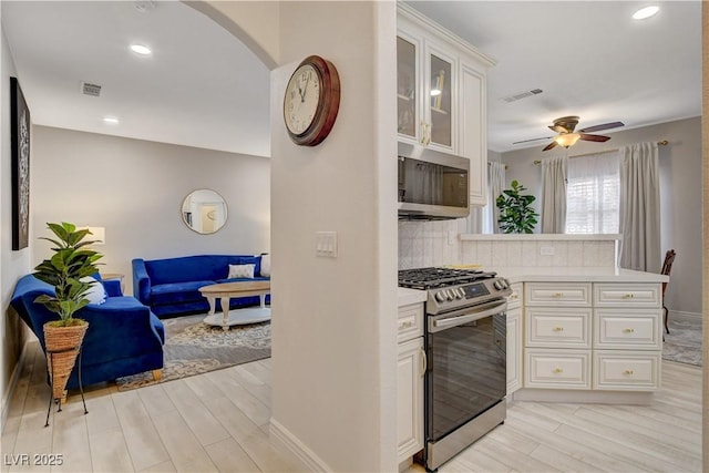 9000 Las Vegas Blvd Unit 2060, Las Vegas, NV 89123 - kitchen with stainless steel appliances, light countertops, a ceiling fan, light wood-type flooring, and recessed lighting